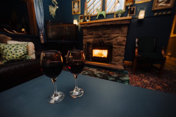 Lounge - 2 glasses of wine by the fire